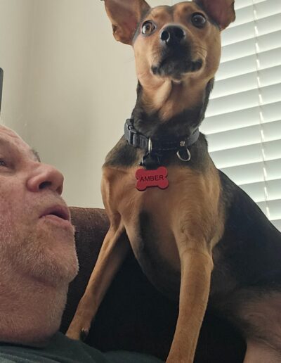 Amber Fenison standing on her daddy's sholder.